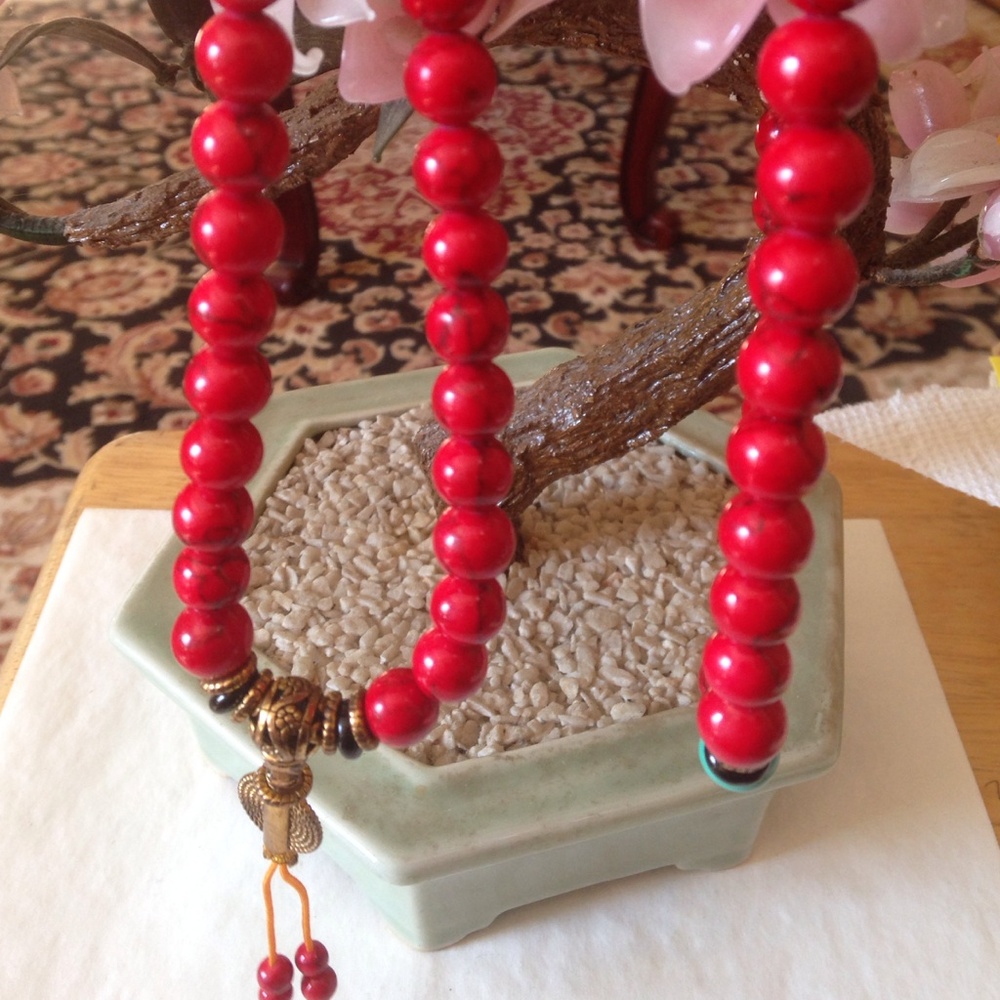 Vintage one of a kind coral  Buddha prayer